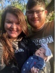 Couple holding new baby