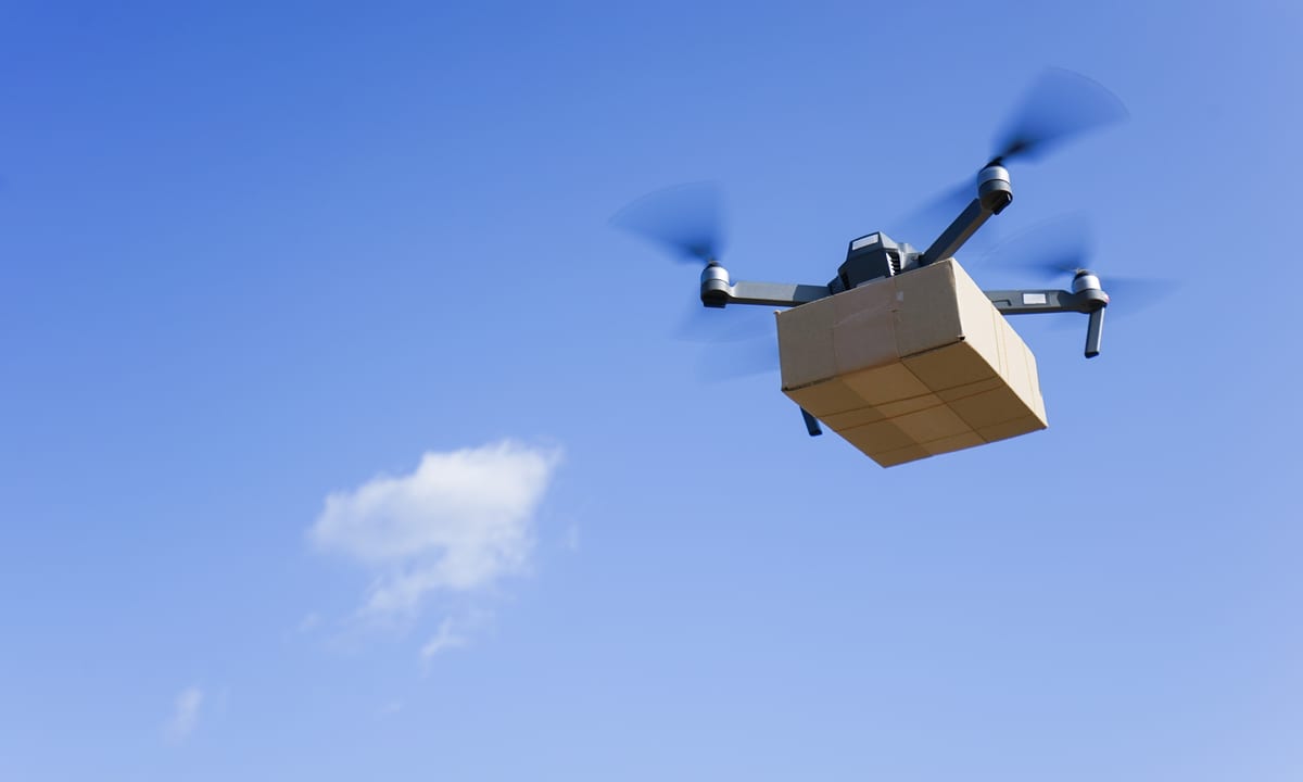Drone delivering a package