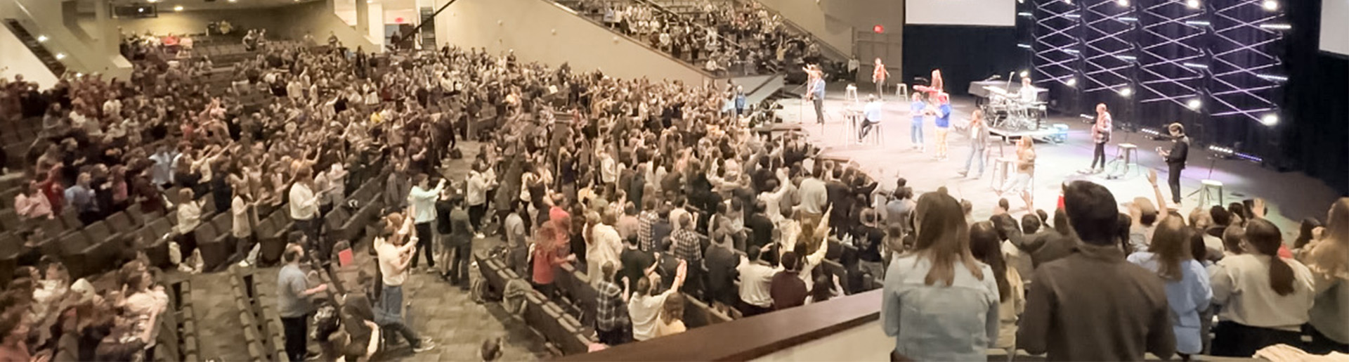 A landscape shot of students worshipping during chapel at Cedarville University.